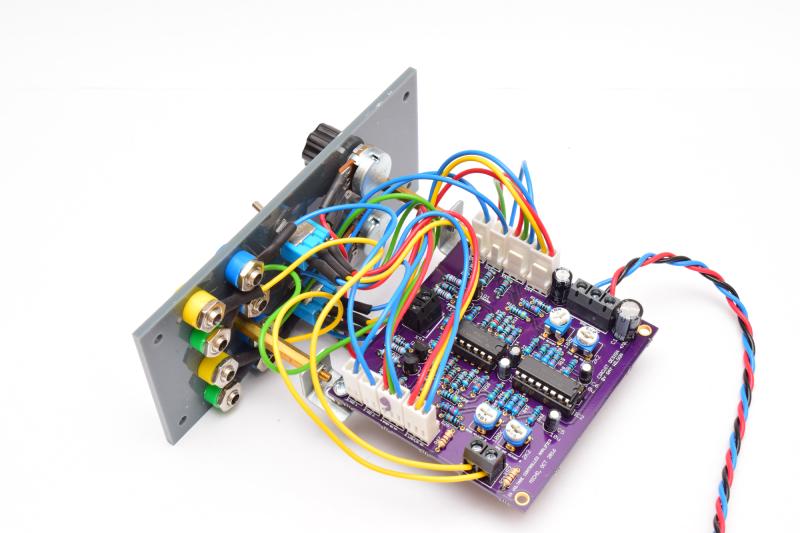 Back of the module showing a purple PCB and colourful wiring